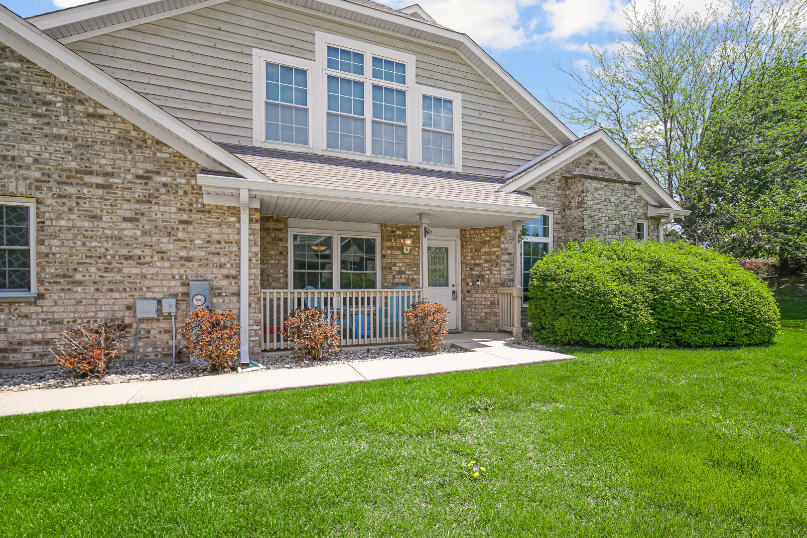 902 Boxwood Drive Munster, IN 46321 - Photo 22 of 23 a house view with a sitting space and garden