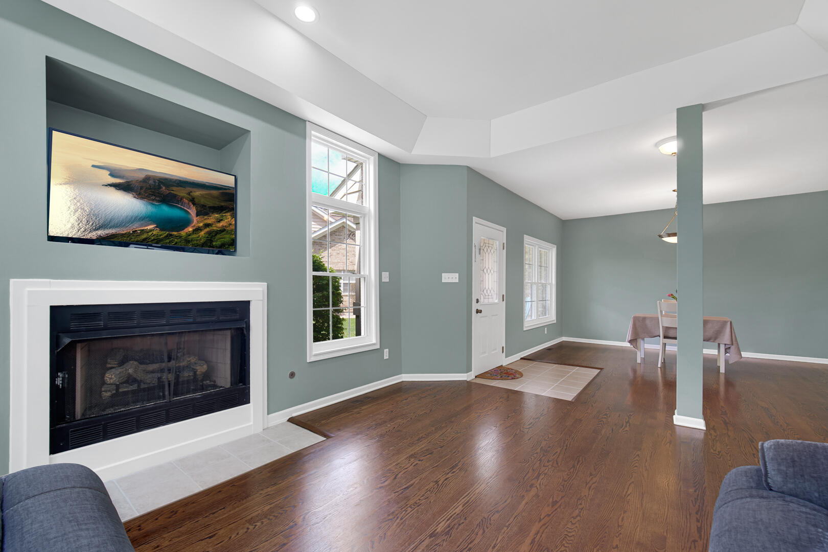 902 Boxwood Drive Munster, IN 46321 - Photo 5 of 23 a living room with furniture and a fireplace
