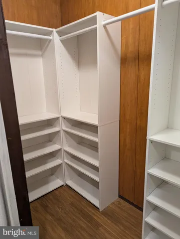 a bathroom with a bathtub and a sink