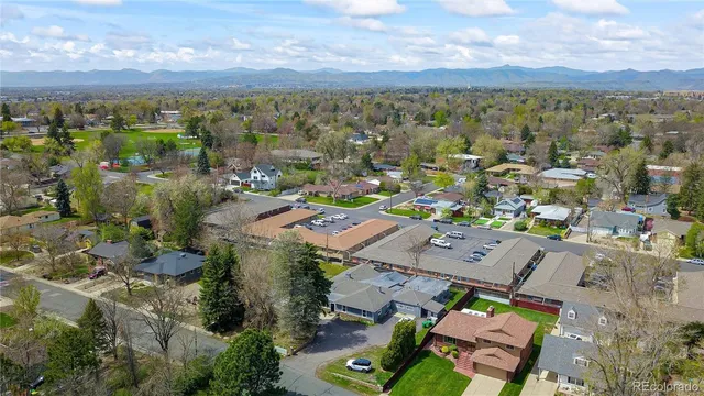 an aerial view of a city with lots of residential buildings