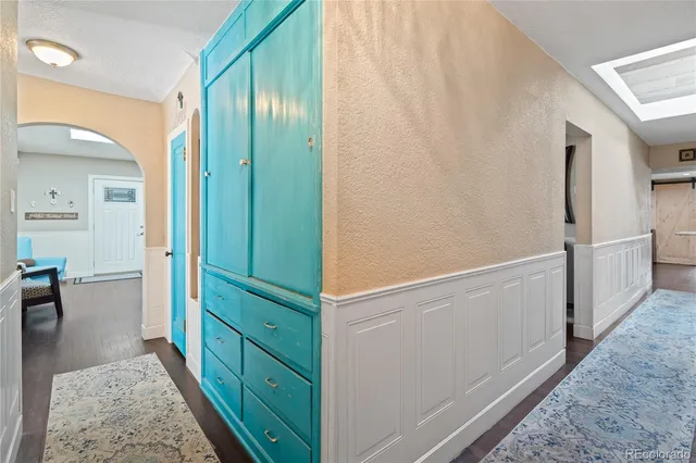 a view of a hallway with windows