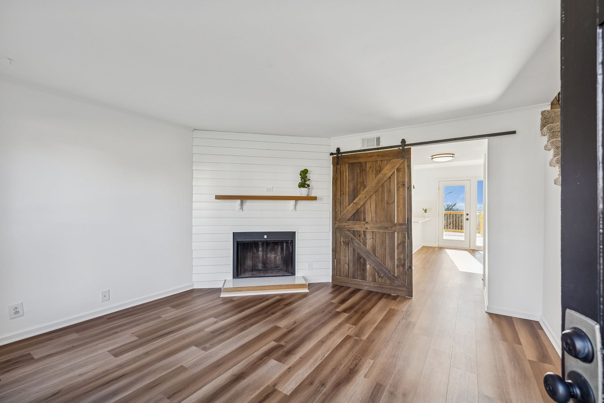 313 Huntington Ridge Drive Nashville, TN 37211 - Photo 6 of 48 a view of a livingroom with wooden floor and a fireplace