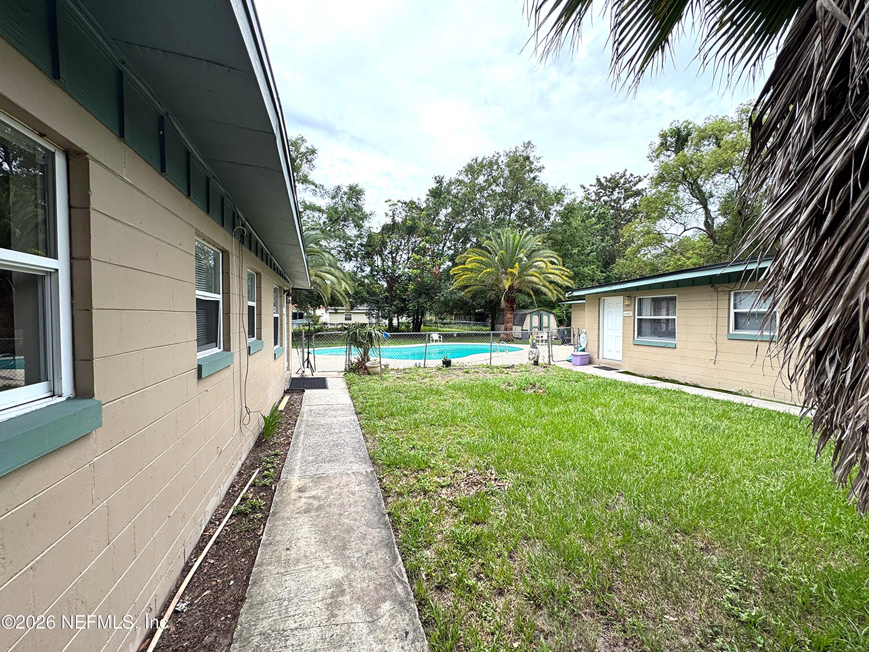 4464 Spring Glen Road, Unit 4464 Jacksonville, FL 32207 - Photo 1 of 15 IMG_2925
