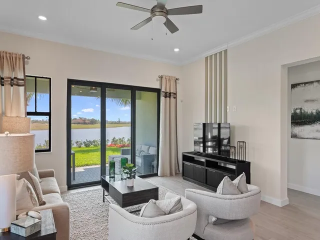 a front view of a house with a yard and porch
