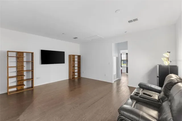 a view of a livingroom with a flat screen tv