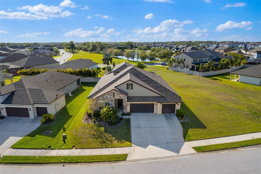 13065 Bliss Loop Bradenton, FL 34211 - Photo 47 of 54 an aerial view of a house with a big yard