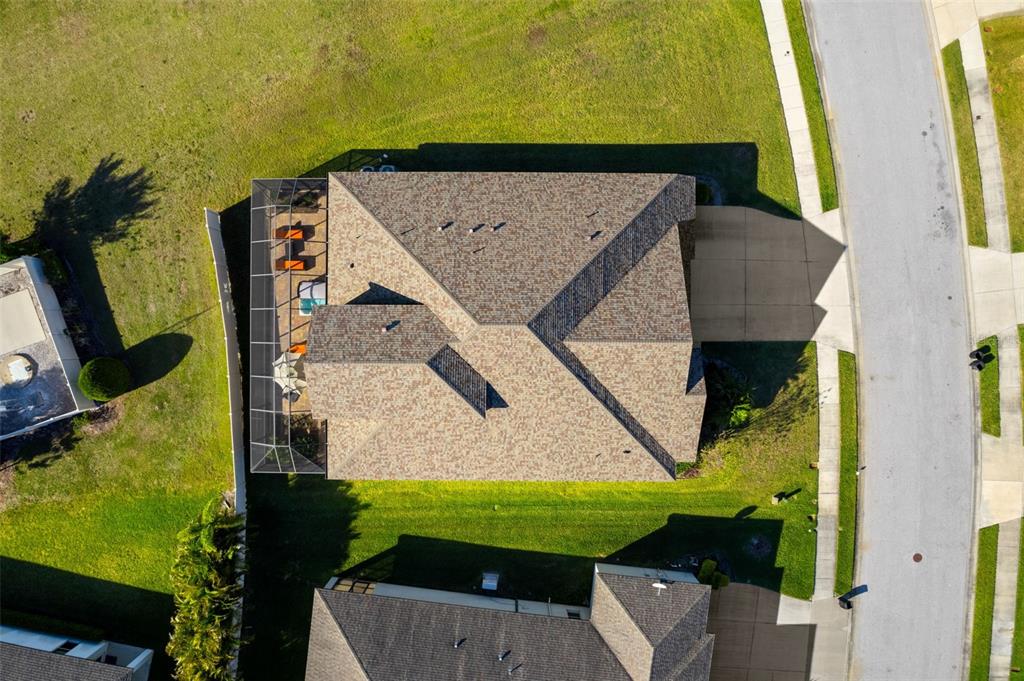 13065 Bliss Loop Bradenton, FL 34211 - Photo 49 of 54 a view of an outdoor space and a front view of a house