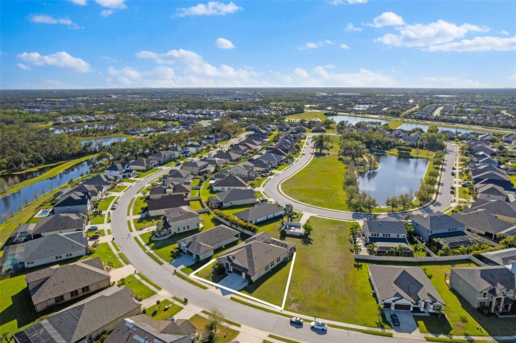13065 Bliss Loop Bradenton, FL 34211 - Photo 50 of 54 an aerial view of residential houses with outdoor space