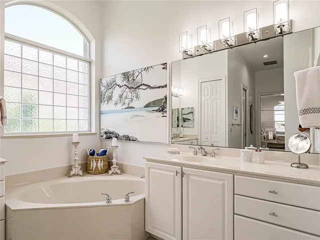 a bathroom with a sink and a bathtub