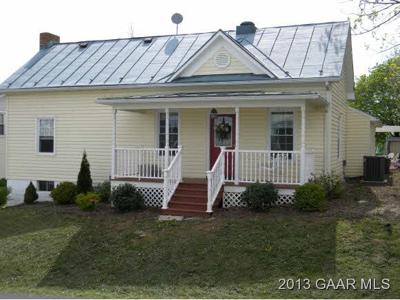 4146 Spring Hill Road Staunton, VA 24401 - Photo 1 of 1 a view of a house with a small yard and plants