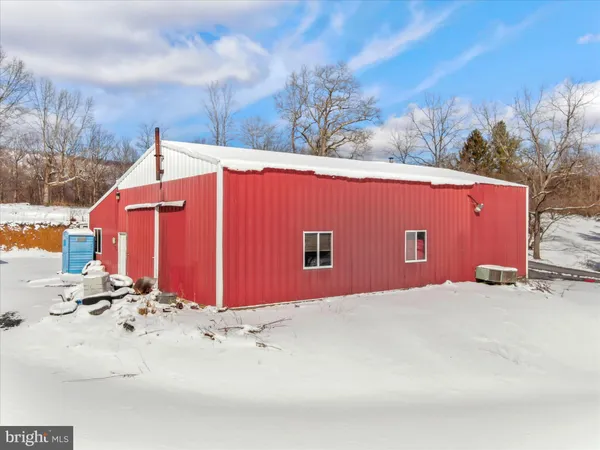 a view of a backyard of the house