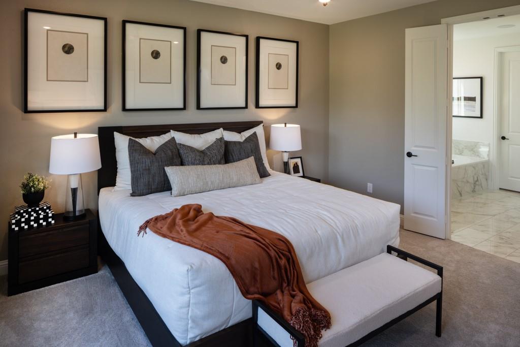 550 Wisteria Street Oak Point, TX 75068 - Photo 14 of 27 a bedroom with a bed and window