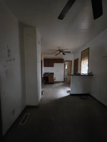 a view of empty room with a window