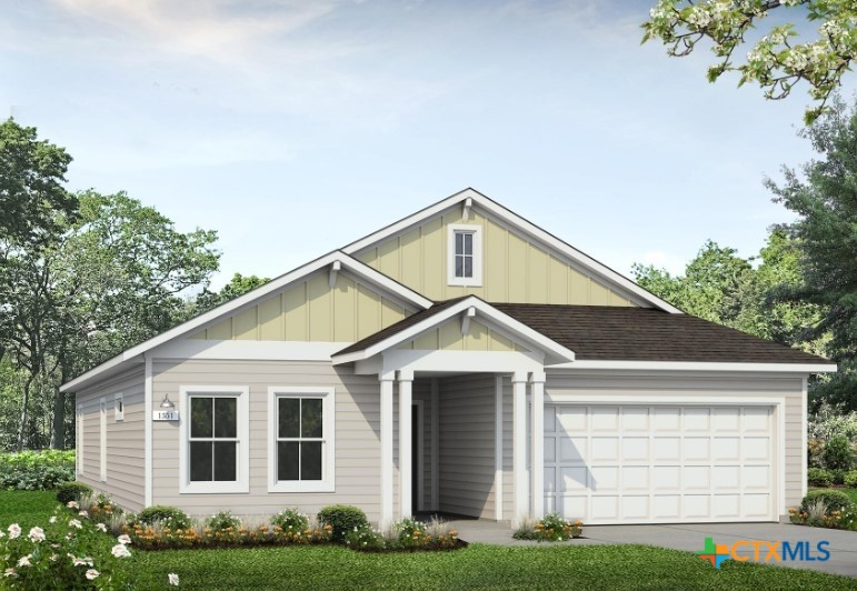 2431 Winding Creek Road Kyle, TX 78640 - Photo 1 of 29 a front view of a house with a yard and garage