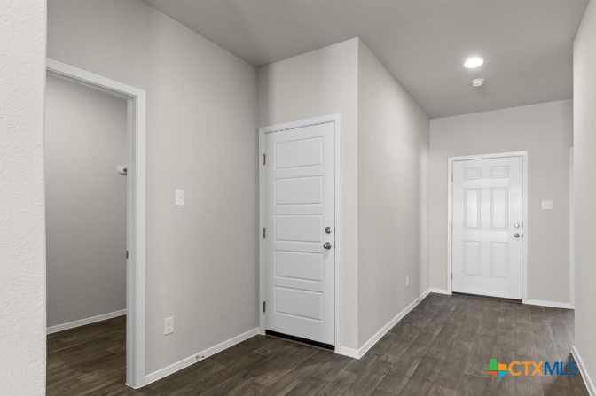 2431 Winding Creek Road Kyle, TX 78640 - Photo 8 of 29 a view of an empty room