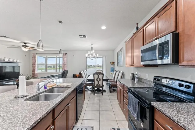 a kitchen with granite countertop lots of counter top space