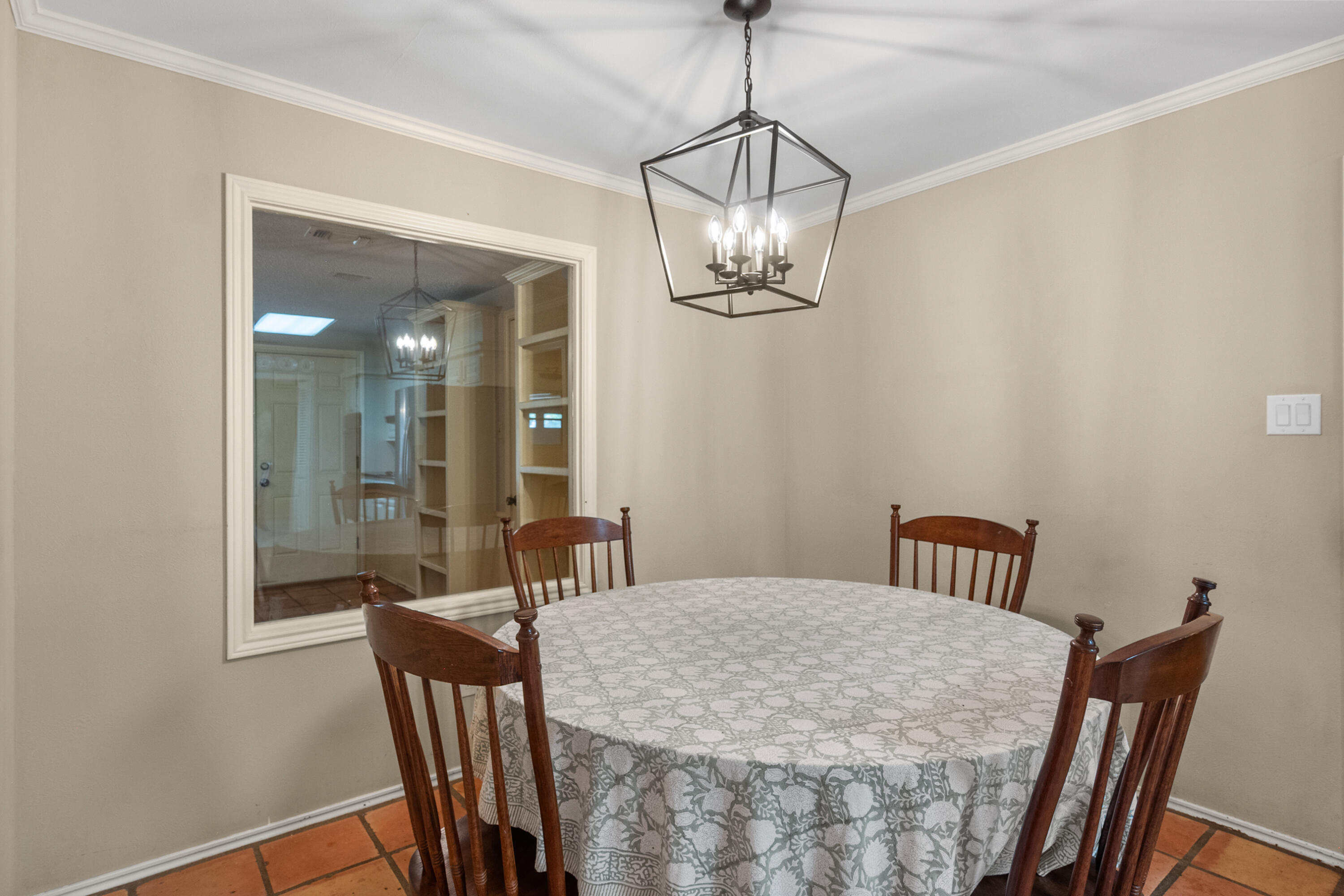 3801 66th Street Lubbock, TX 79413 - Photo 15 of 36 a view of a dining room with a table and chairs