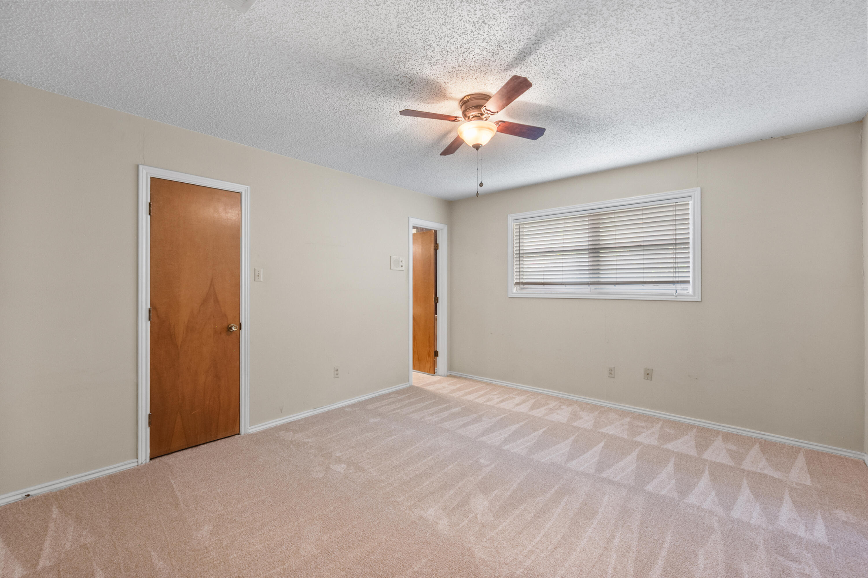 3801 66th Street Lubbock, TX 79413 - Photo 26 of 36 a view of an empty room with a window