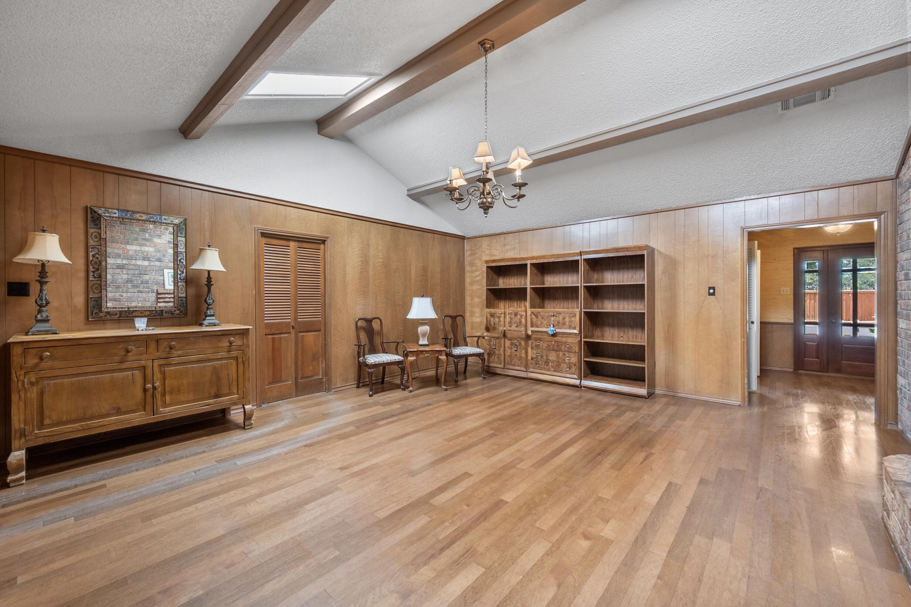 3801 66th Street Lubbock, TX 79413 - Photo 6 of 36 a view of a bedroom with furniture and windows