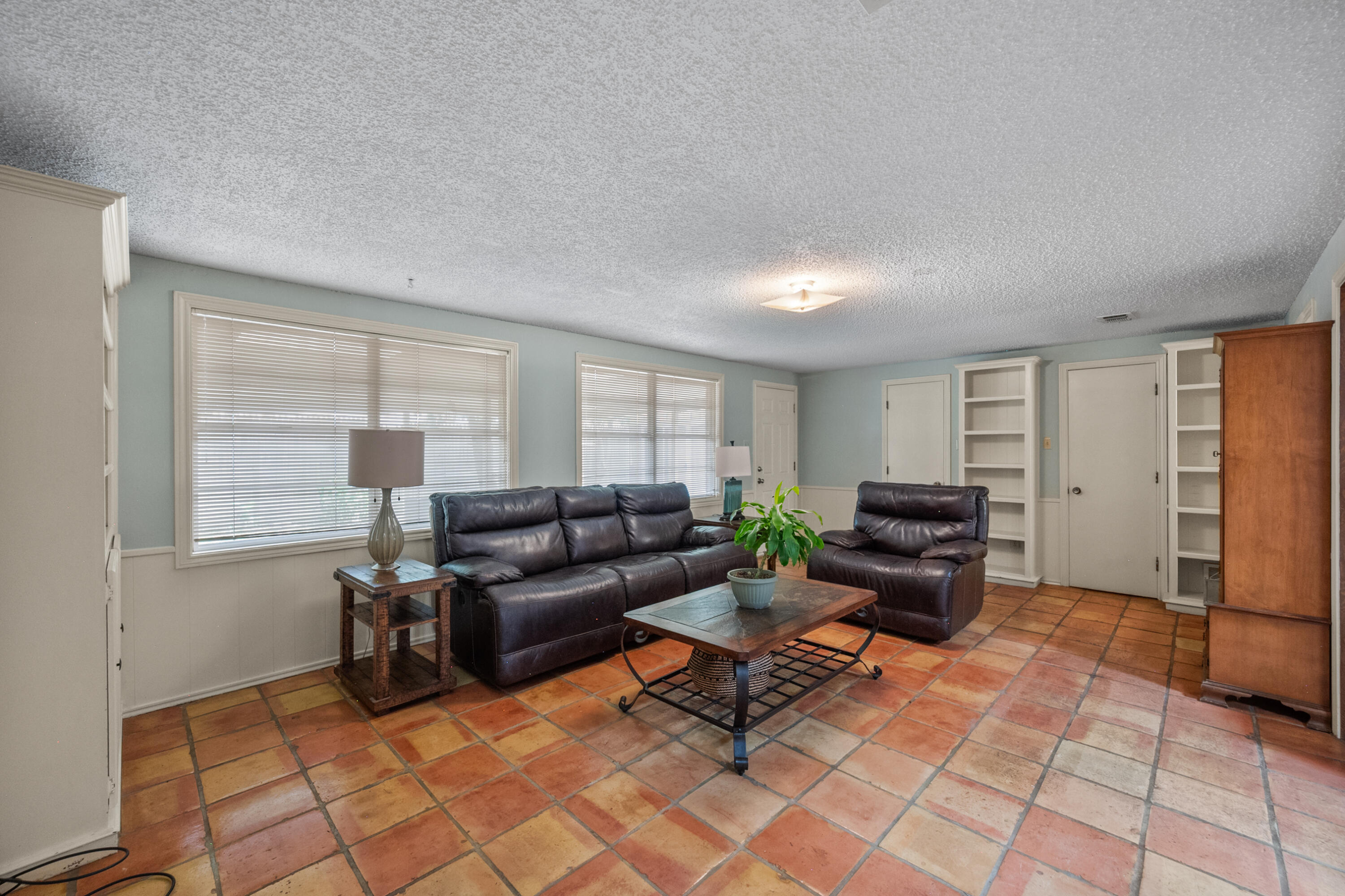 3801 66th Street Lubbock, TX 79413 - Photo 10 of 36 a living room with furniture and a window