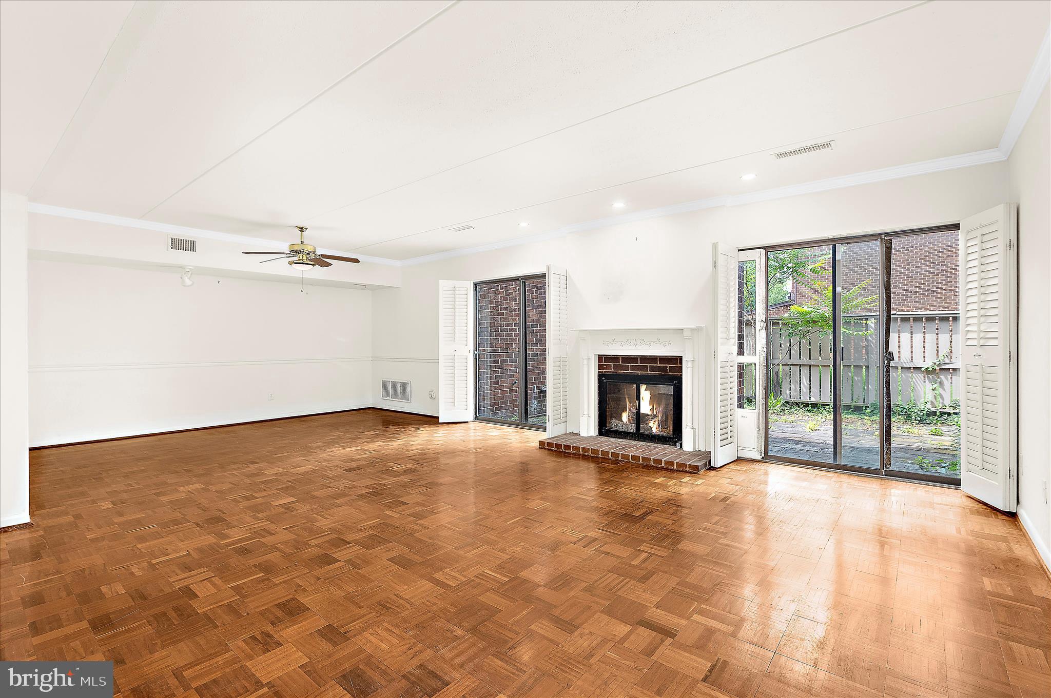 24 Fencepost Court, Unit G Baltimore, MD 21208 - Photo 8 of 54 Living Room with Double Walk-Out