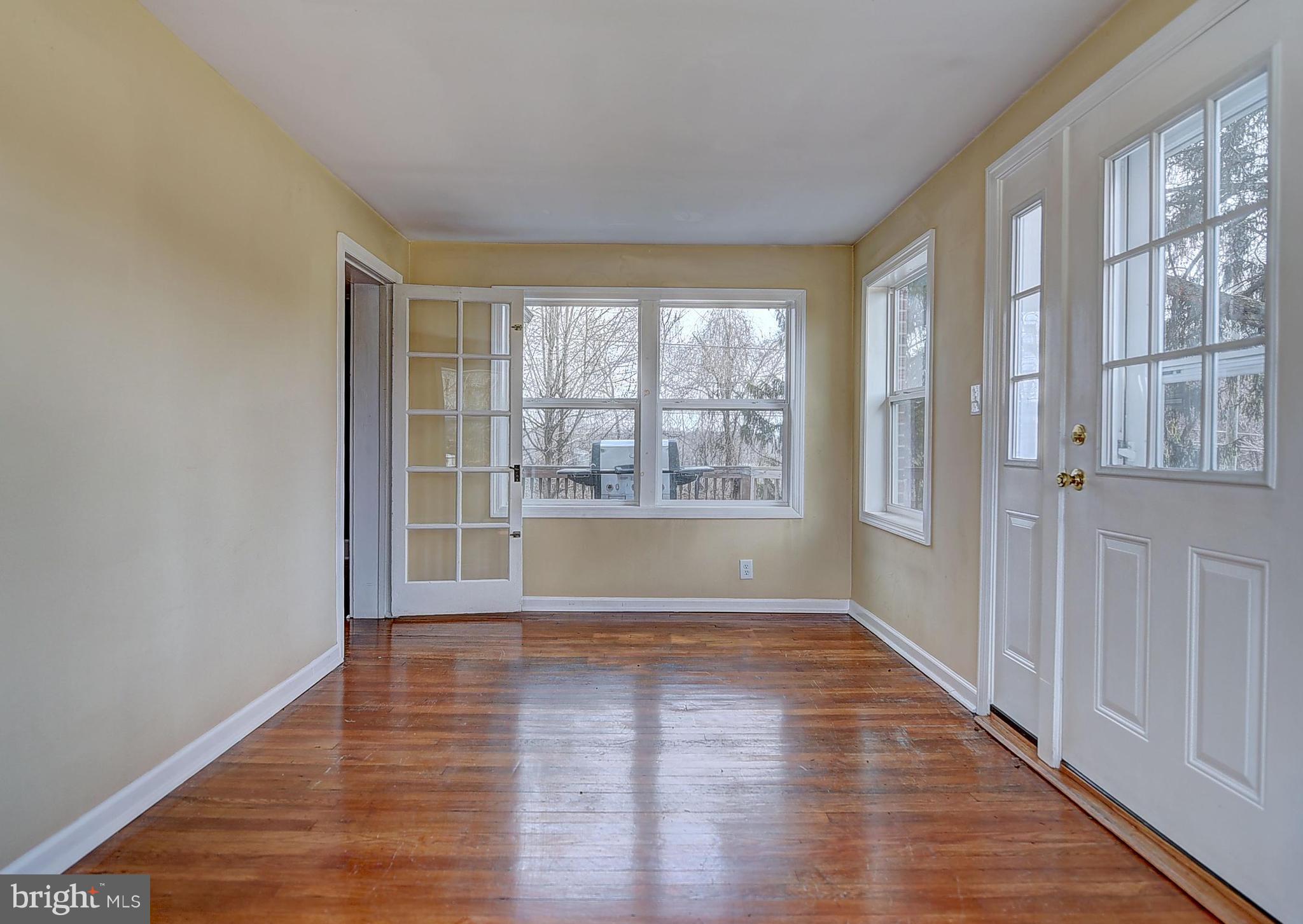387 Rock Springs Road Conowingo, MD 21918 - Photo 14 of 25 Shining hardwood floors throughout living spave