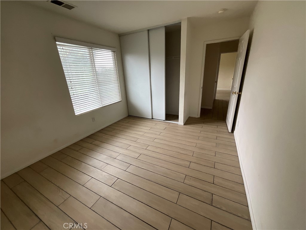 11875 Cedarbrook Place Rancho Cucamonga, CA 91730 - Photo 17 of 26 an empty room with windows