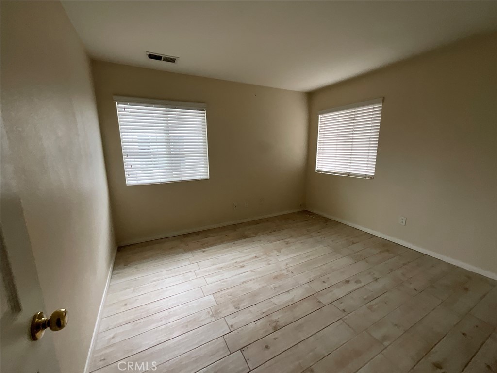 11875 Cedarbrook Place Rancho Cucamonga, CA 91730 - Photo 24 of 26 a view of an empty room with a window