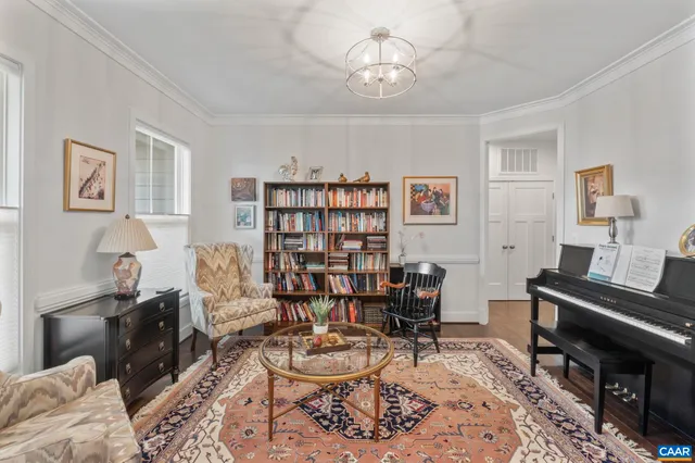 a view of a chair and table in the garden