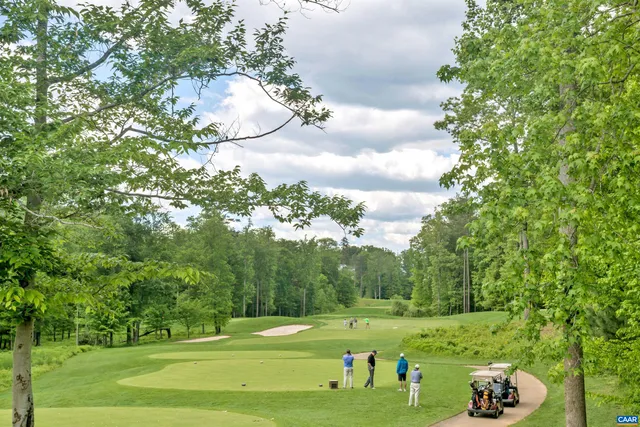 a view of a golf course with a trees