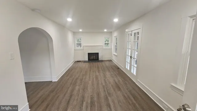 a view of a kitchen from the hallway