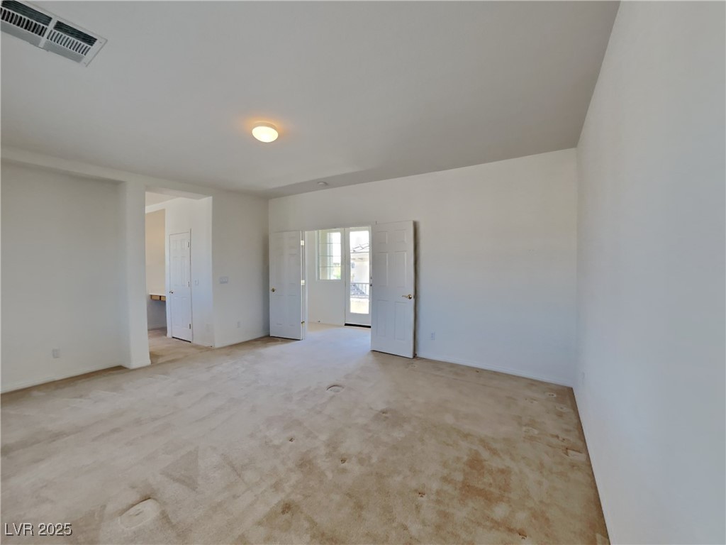 9456 Bluff Ledge Avenue Las Vegas, NV 89149 - Photo 12 of 35 Unfurnished room with light carpet