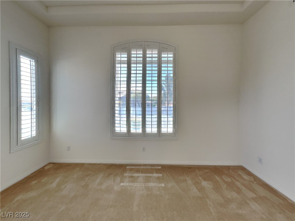 9456 Bluff Ledge Avenue Las Vegas, NV 89149 - Photo 30 of 35 Unfurnished room with light colored carpet and baseboards