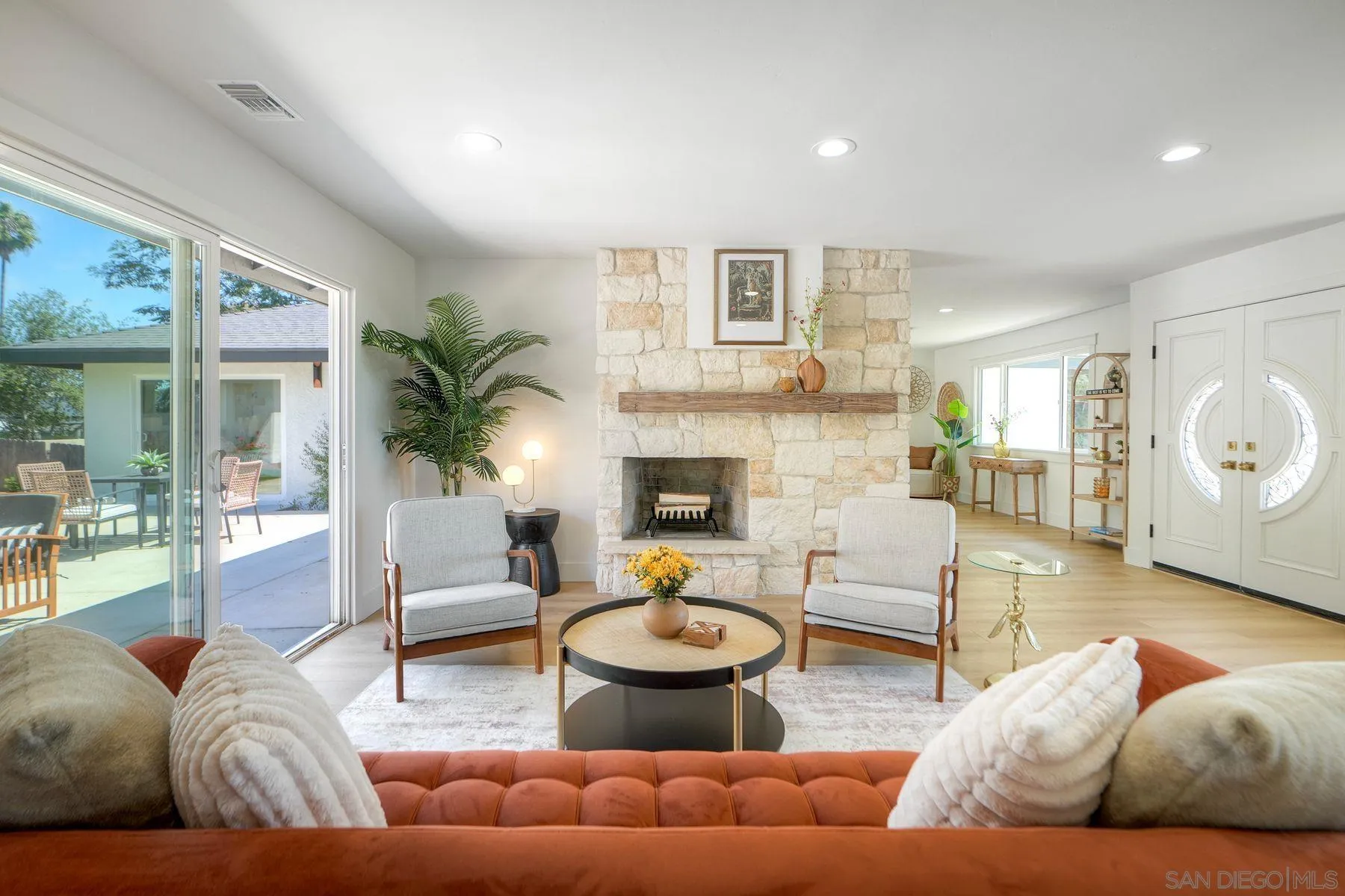 1870 Laurel Road Oceanside, CA 92054 - Photo 17 of 57 a living room with furniture and a fireplace