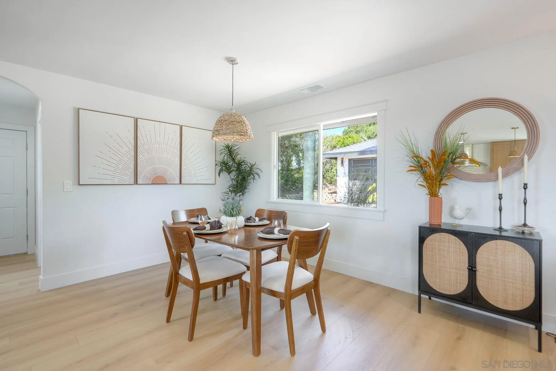 1870 Laurel Road Oceanside, CA 92054 - Photo 18 of 57 a view of a dining room with furniture window and wooden floor