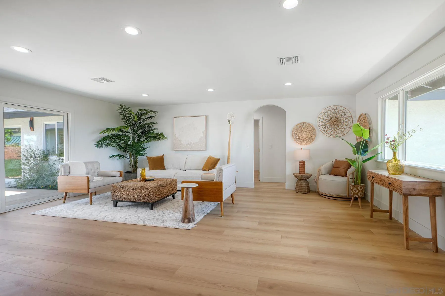 1870 Laurel Road Oceanside, CA 92054 - Photo 19 of 57 a living room with furniture and a large window