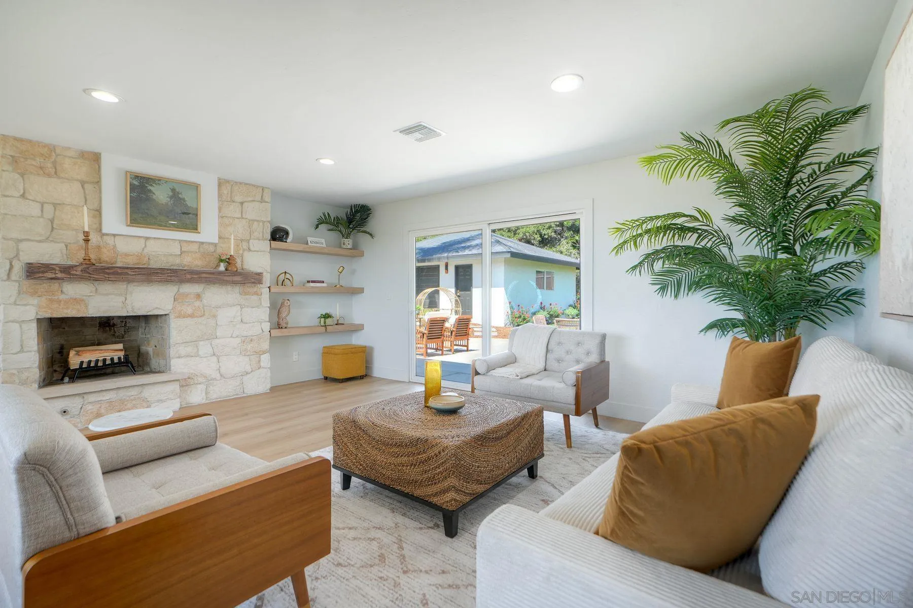 1870 Laurel Road Oceanside, CA 92054 - Photo 20 of 57 a living room with furniture and a fireplace