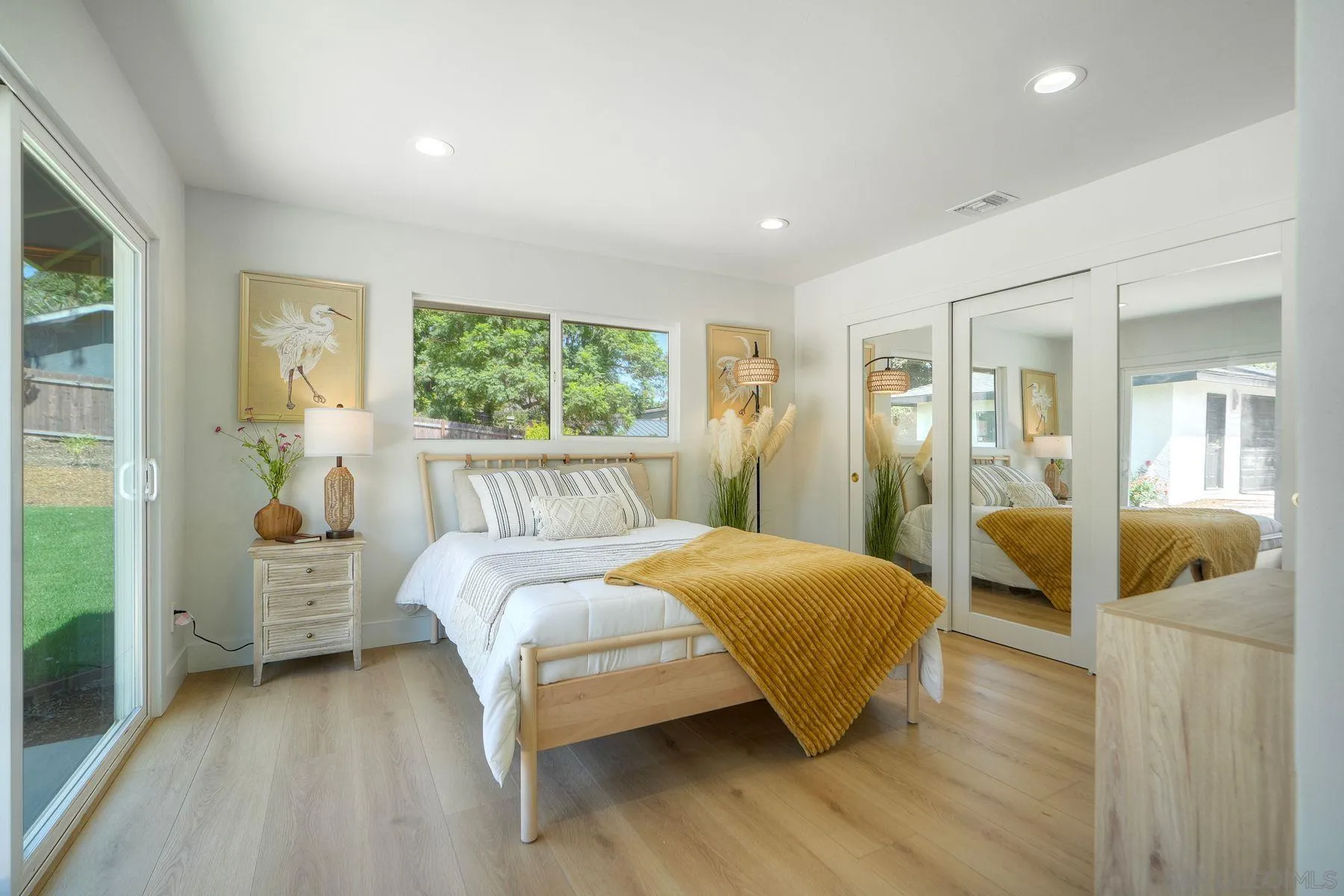 1870 Laurel Road Oceanside, CA 92054 - Photo 25 of 57 a bedroom with a bed and a large window