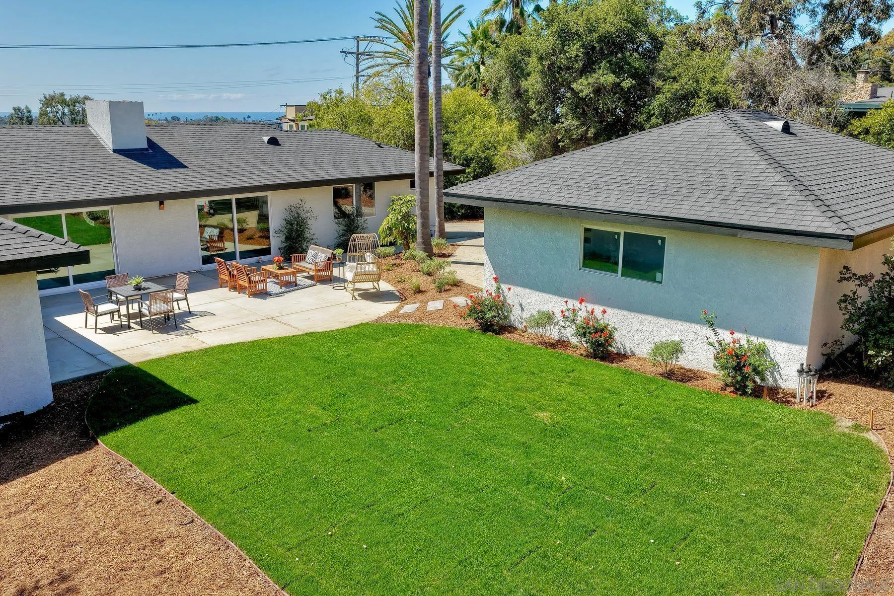 1870 Laurel Road Oceanside, CA 92054 - Photo 46 of 57 a view of house with backyard and outdoor seating