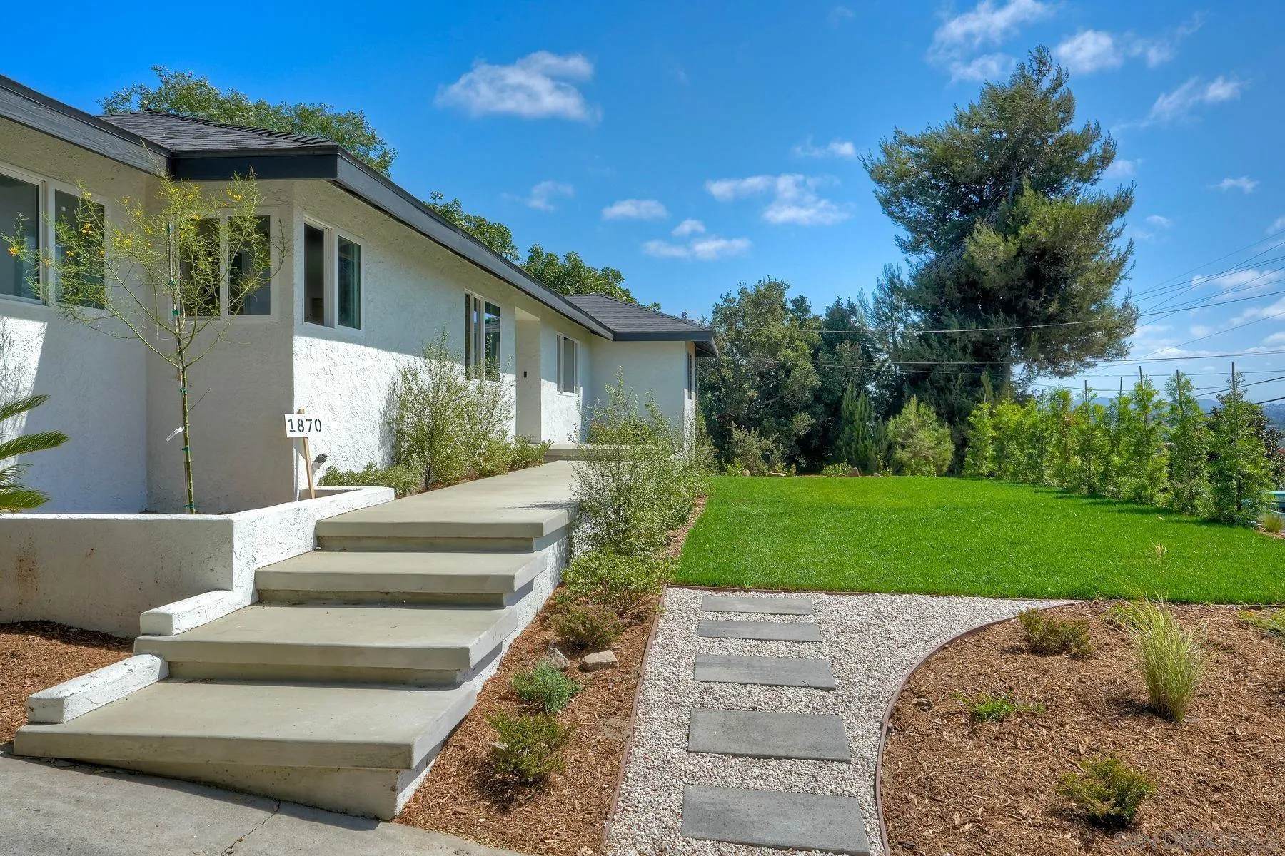 1870 Laurel Road Oceanside, CA 92054 - Photo 5 of 57 a view of a house with a yard