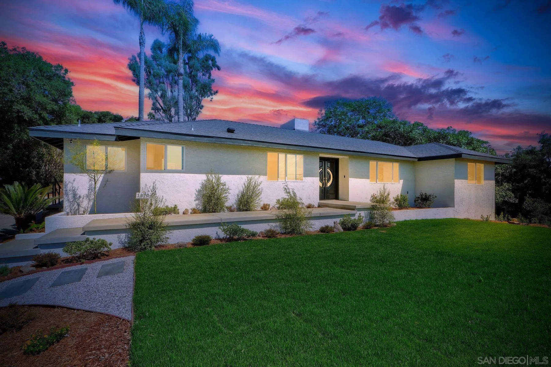 1870 Laurel Road Oceanside, CA 92054 - Photo 57 of 57 a front view of a house with patio