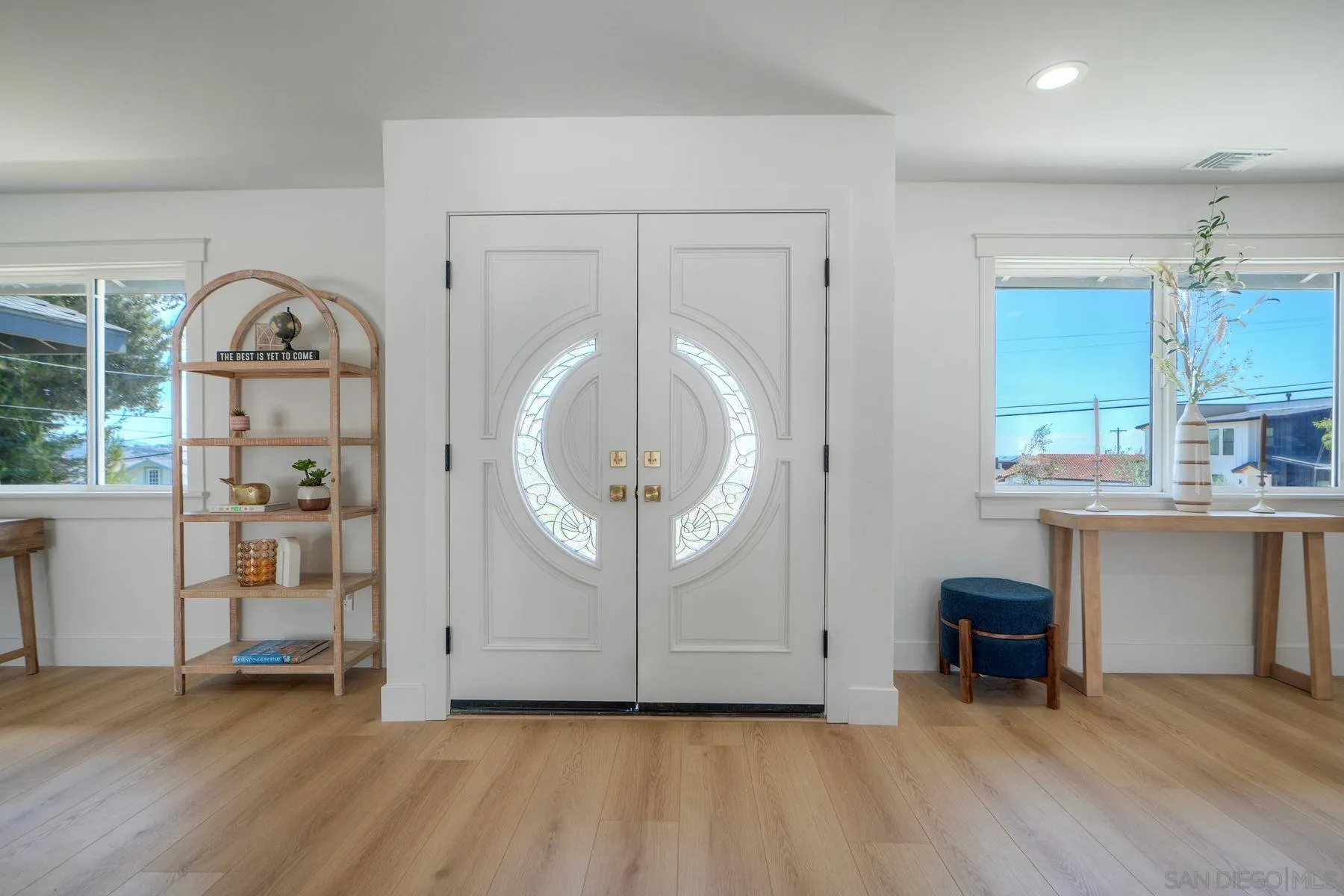 1870 Laurel Road Oceanside, CA 92054 - Photo 7 of 57 an empty room with fireplace and wooden floor