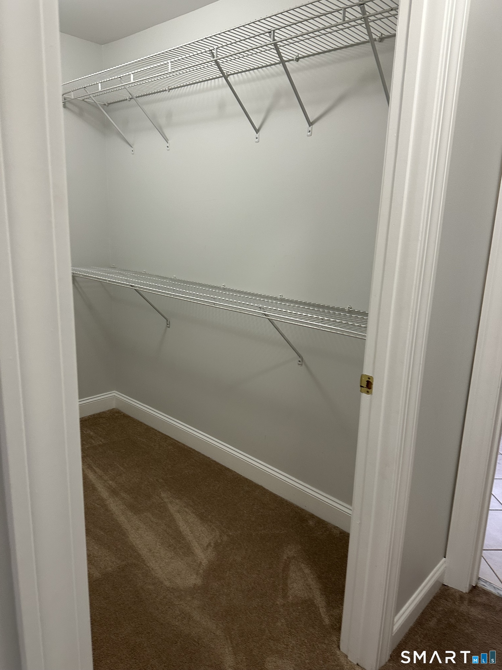 128 Center Road Easton, CT 06612 - Photo 27 of 39 Walk in primary closet
