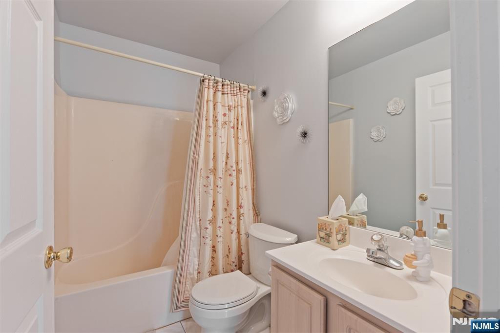 11 Parkside Court Wayne, NJ 07470 - Photo 12 of 22 a bathroom with a sink toilet and shower