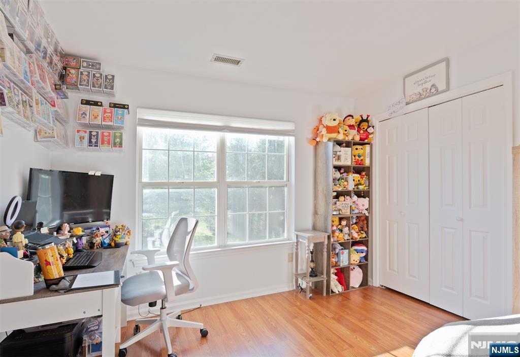 11 Parkside Court Wayne, NJ 07470 - Photo 13 of 22 a view of a workspace with furniture and a window