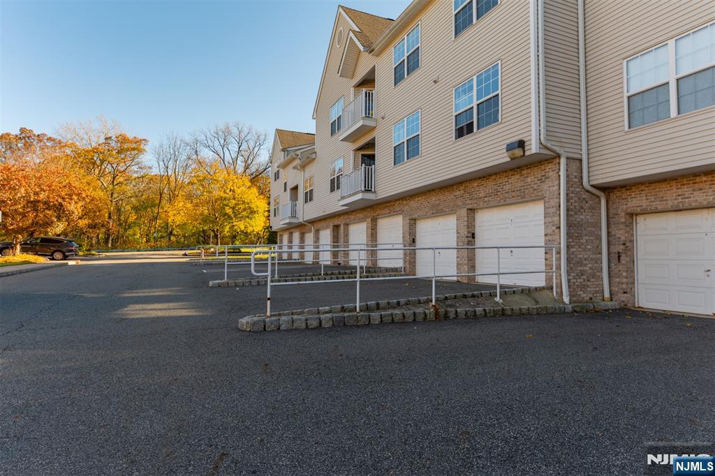 11 Parkside Court Wayne, NJ 07470 - Photo 22 of 22 a view of a building with a street