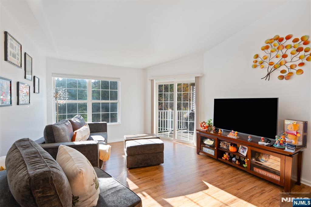 11 Parkside Court Wayne, NJ 07470 - Photo 4 of 22 a living room with furniture and a flat screen tv