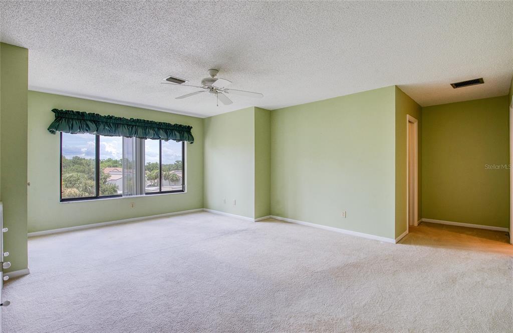 700 Starkey Road, Unit 1145 Largo, FL 33771 - Photo 22 of 63 a view of an empty room with a window