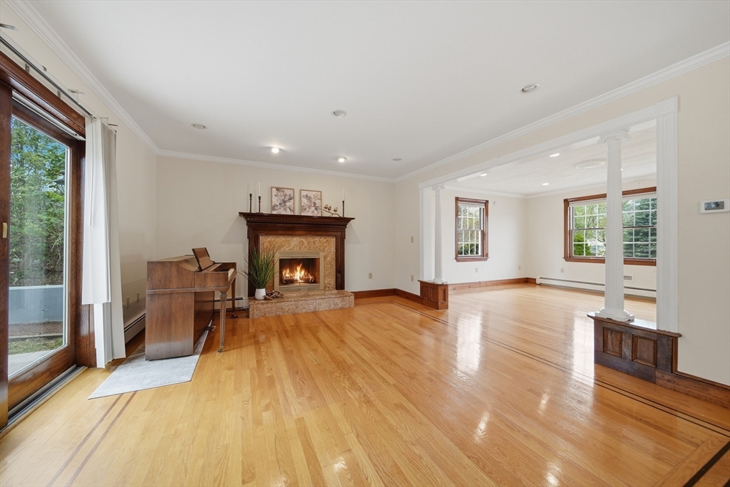 131 Range Heights Road Lynn, MA 01904 - Photo 7 of 36 a view of a livingroom with furniture a fireplace