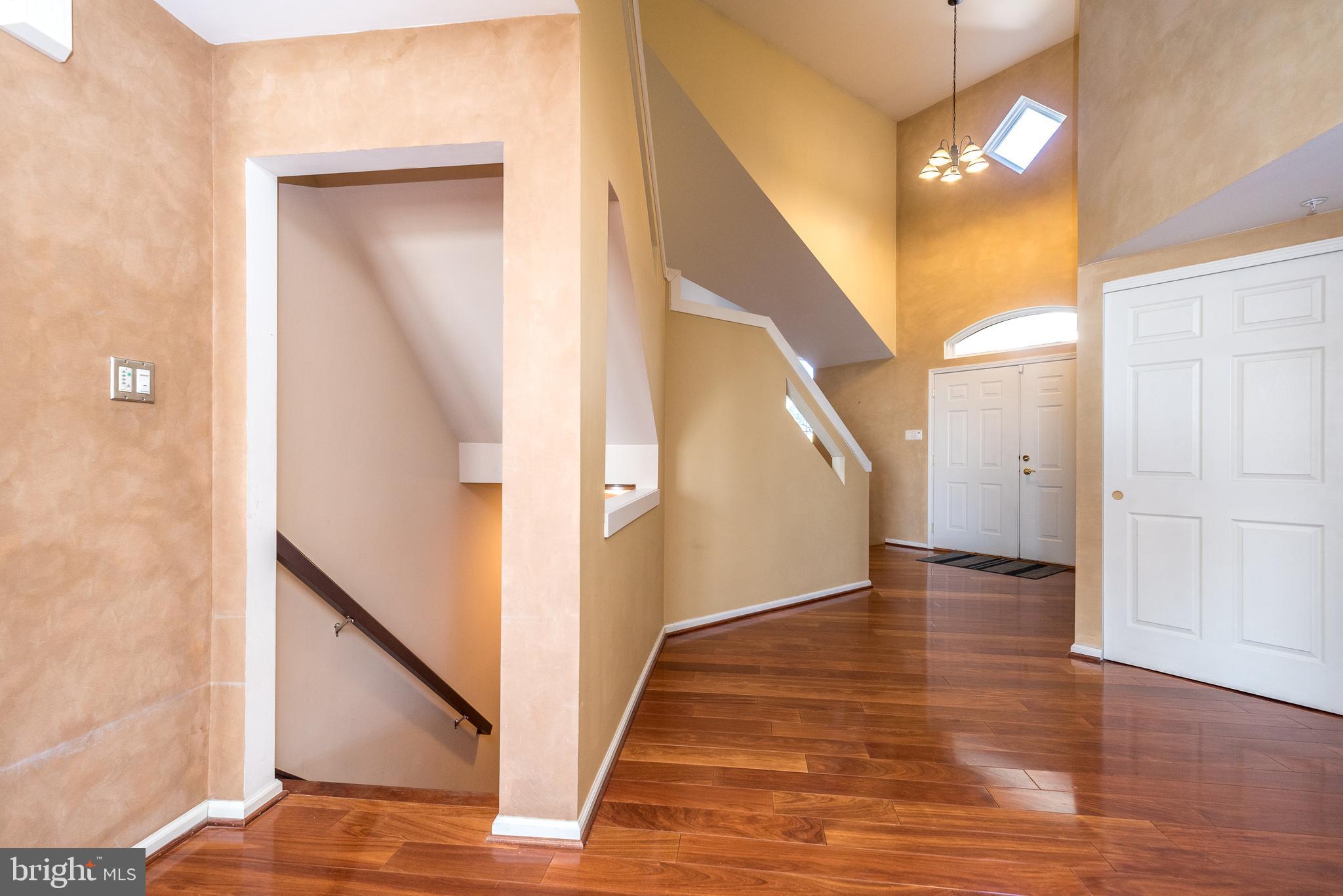 201 Summer Ridge Circle Chalfont, PA 18914 - Photo 28 of 94 View of the foyer and stairway to the lower level